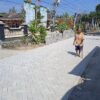 Jalan Hasil TMMD 129 Bikin Mbah Slamet Lebih Nyaman Jalan Kaki